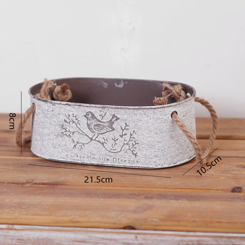 Decorative storage basket made of metal with natural design Bowlift