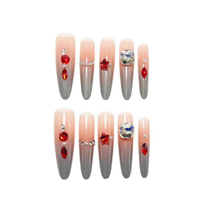 Glamorous artificial nails with rhinestones and embellishments Bowlift