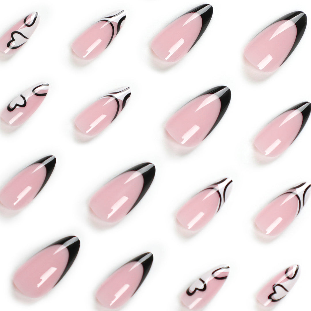 Artful stiletto nails with elegant black-and-white design Bowlift