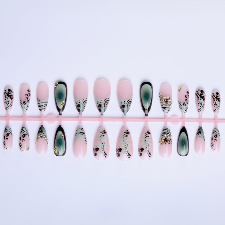 Artful Stiletto Fingernails with Floral and Geometric Decorations Bowlift