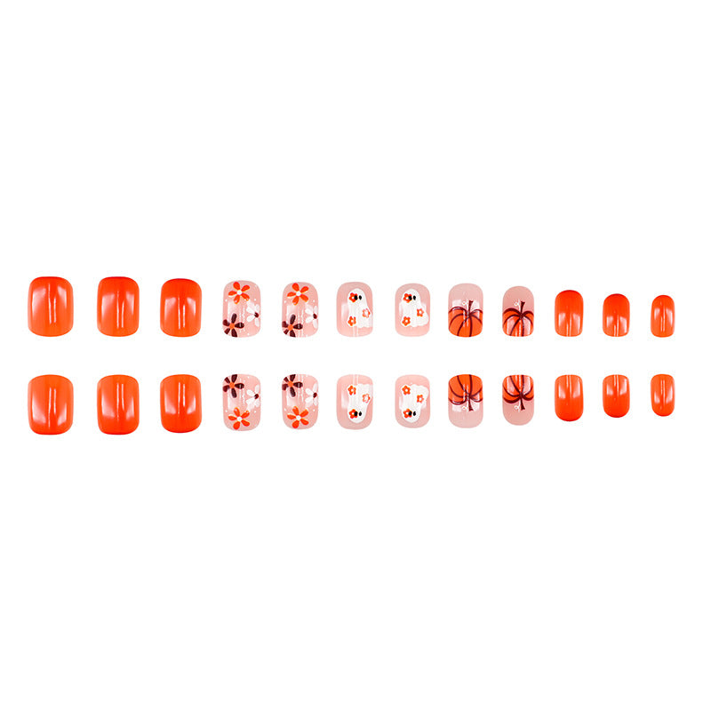 Artistic Press-On Nail Set with Halloween Themed Designs Bowlift