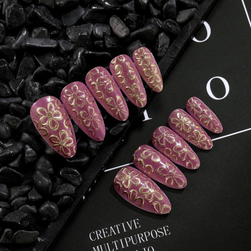 Glittering artificial nails with floral patterns Bowlift