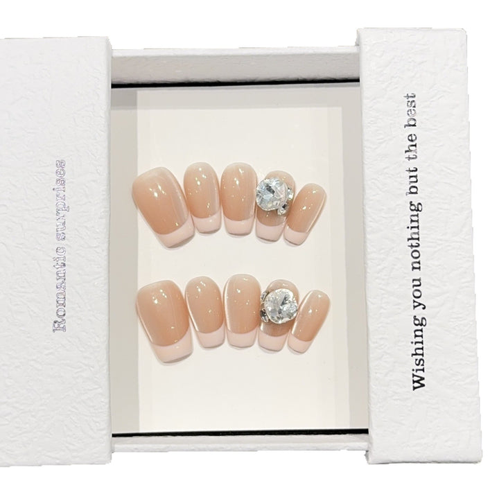 Artificial nail tips with elegant rhinestone accents Bowlift