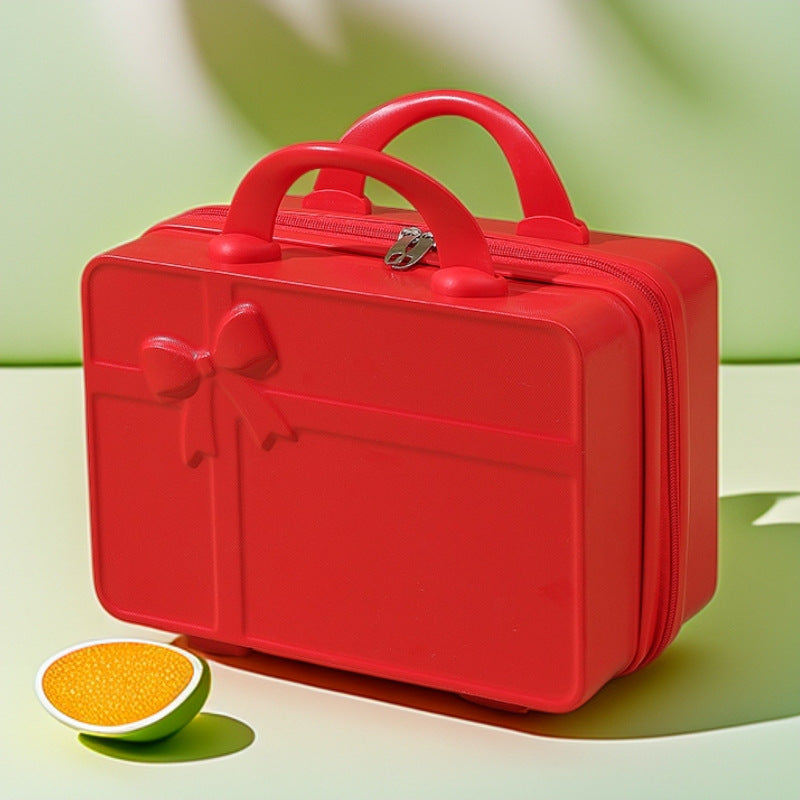structured hard-shell cosmetic travel case with embossed bow and dual top handles Bowlift
