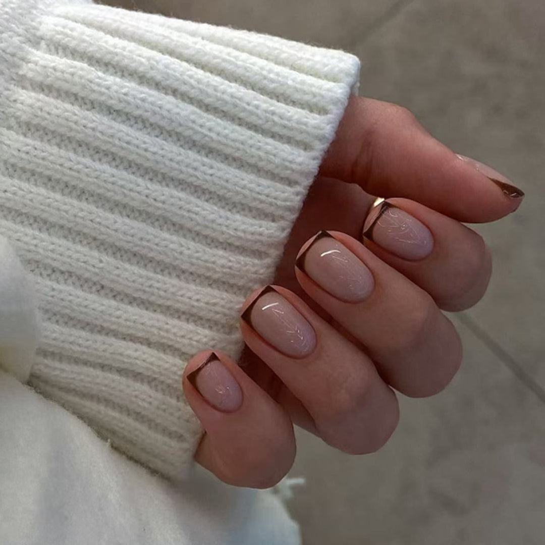 Artful nail design with elegant French tip and glossy finish Bowlift
