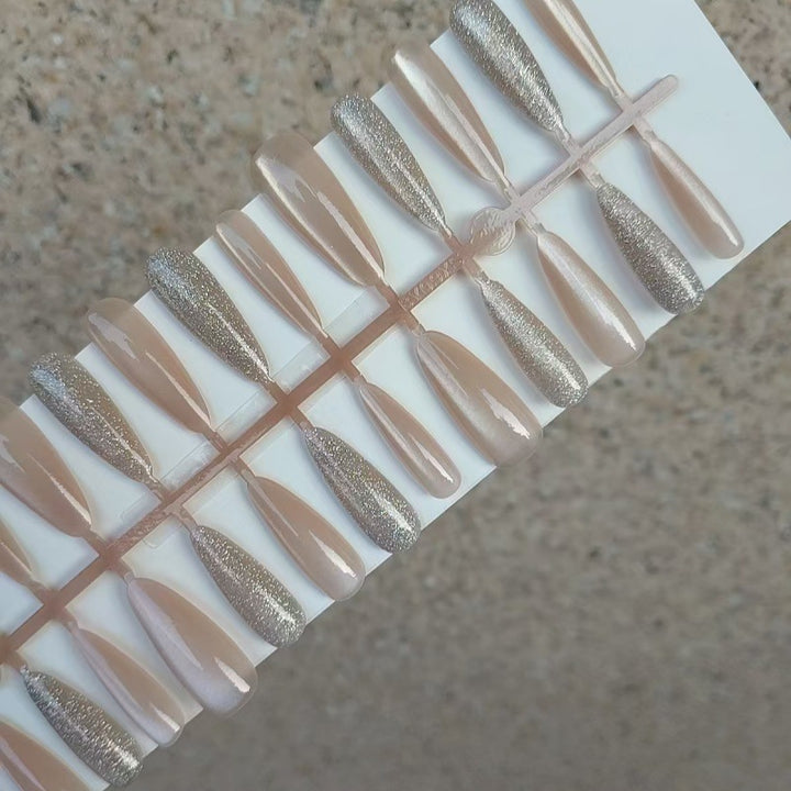 Elegant artificial nails with glitter accents Bowlift