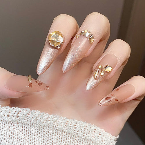 Elegant Glittery Stiletto Press-On Nails with Gemstone Accents Bowlift
