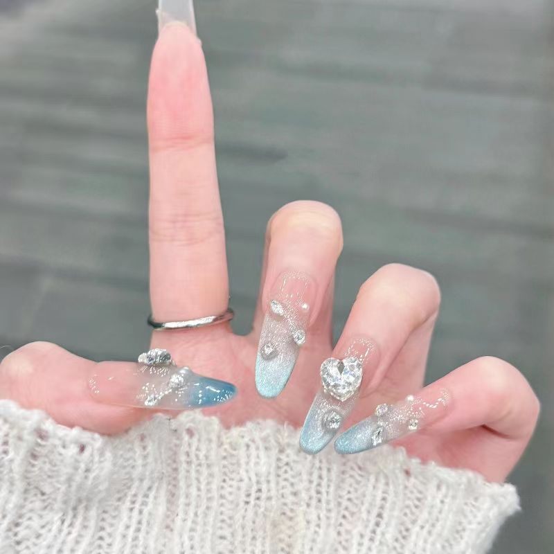 Decorative Long Stiletto Press-On Nails with Silver Accents Bowlift