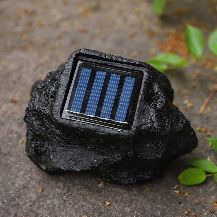 Solar powered faux stone garden spotlight with high efficiency LED array Bowlift