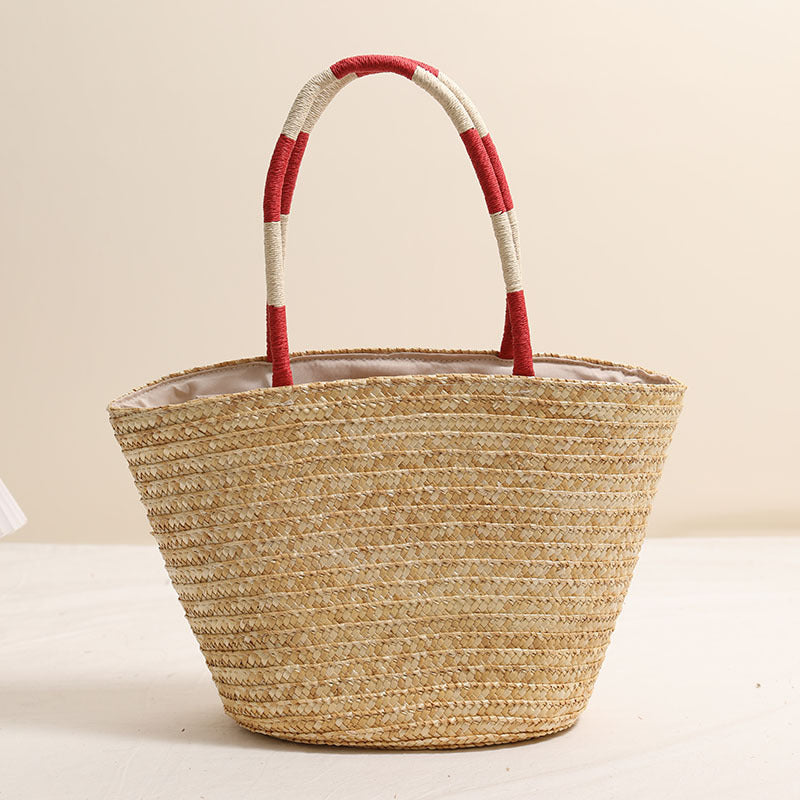 Handcrafted basket bag with vibrant floral embroidery design Bowlift