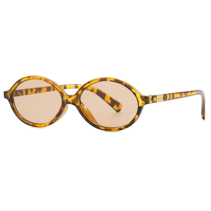 Women's fashionable sunglasses with oval frame and golden accents Bowlift