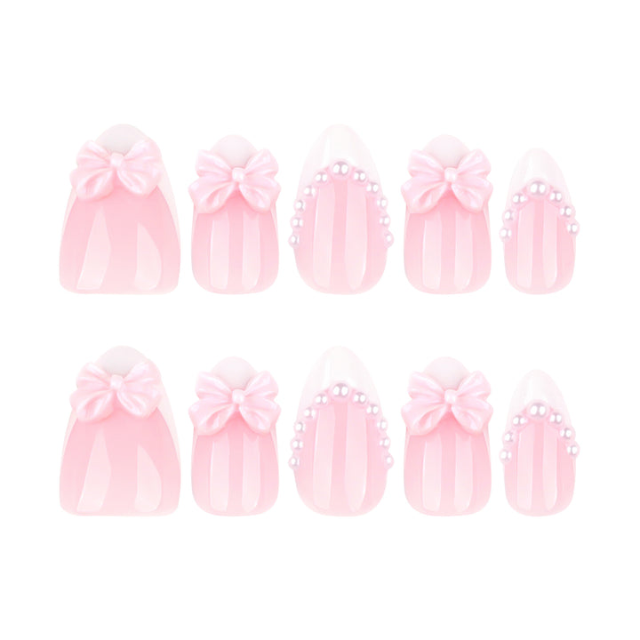 Artful Stiletto Nails with Delicate Bow Accents Bowlift