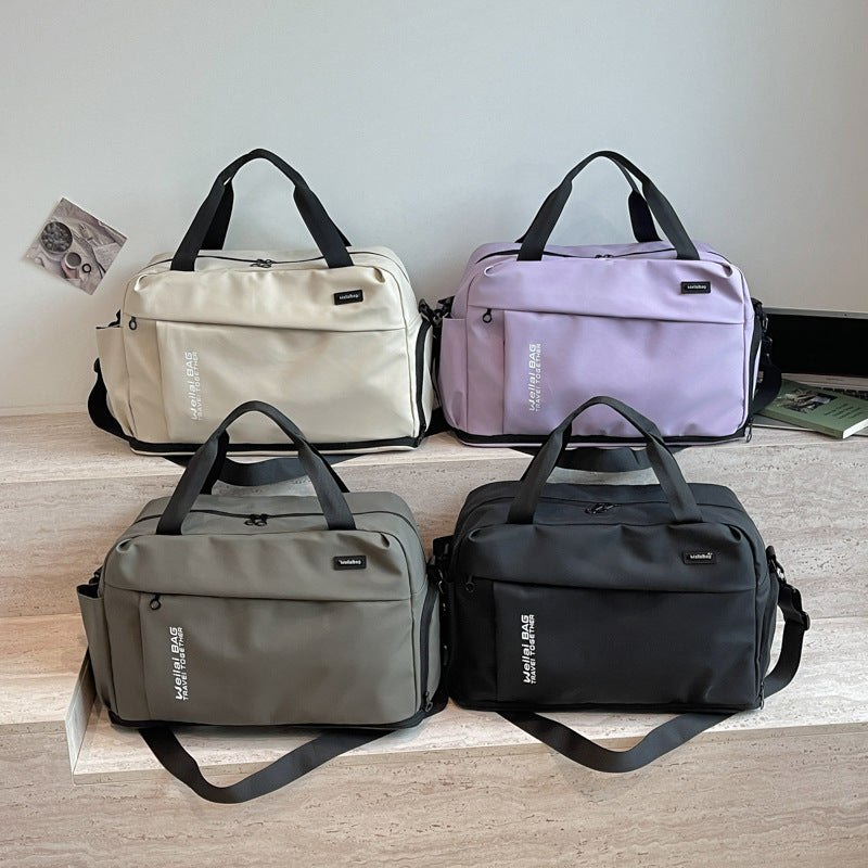 Travel and Sports Bag with Water-Repellent Material and Many Compartments Bowlift