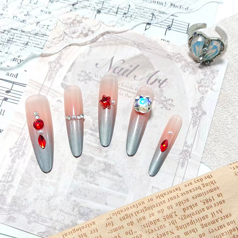 Sparkling artificial nails with decorative rhinestones Bowlift