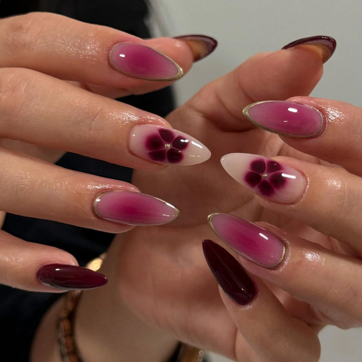 Artistic Nail Art with Ombre Design and Floral Accents Bowlift