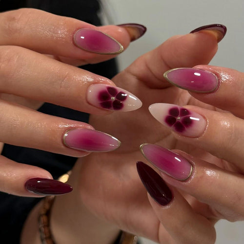 Artistic Nail Art with Ombre Design and Floral Accents Bowlift