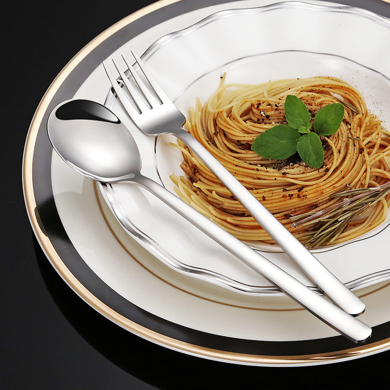 Elegant dessert spoon with luxurious golden surface Bowlift