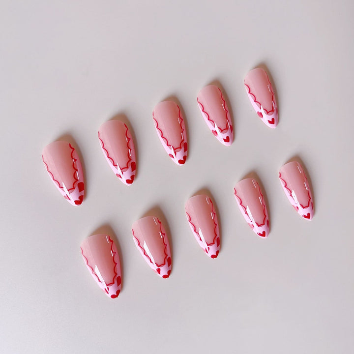 Acrylic nail set with elegant heart tips and creative accents Bowlift