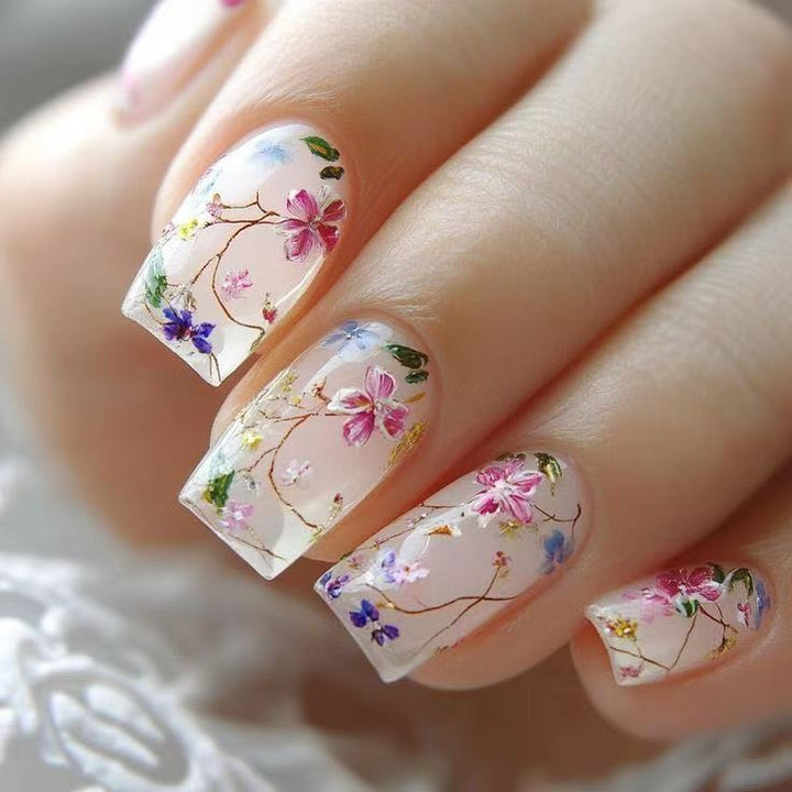 Nail set with floral accents and transparent shine Bowlift
