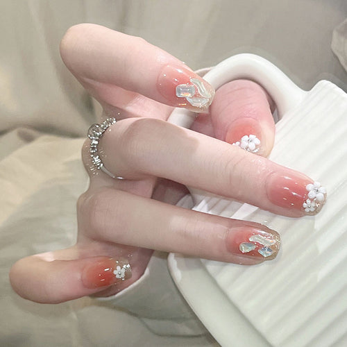 Artificial nail set with floral 3D decorations and elegant glitter Bowlift