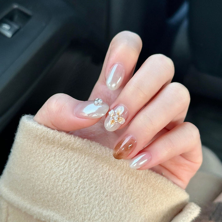 Artificial nails with floral details and glitter coating Bowlift