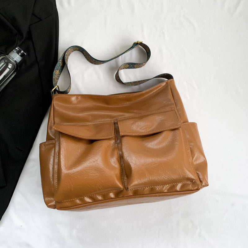 Multifunctional Shoulder Bag With Innovative Compartment System Bowlift