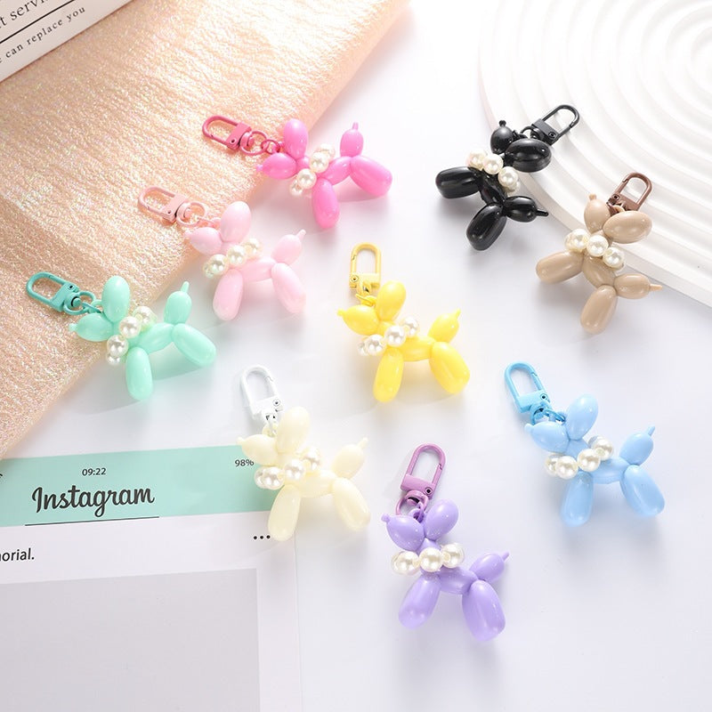 Playful keychain with balloon dog and beads Bowlift