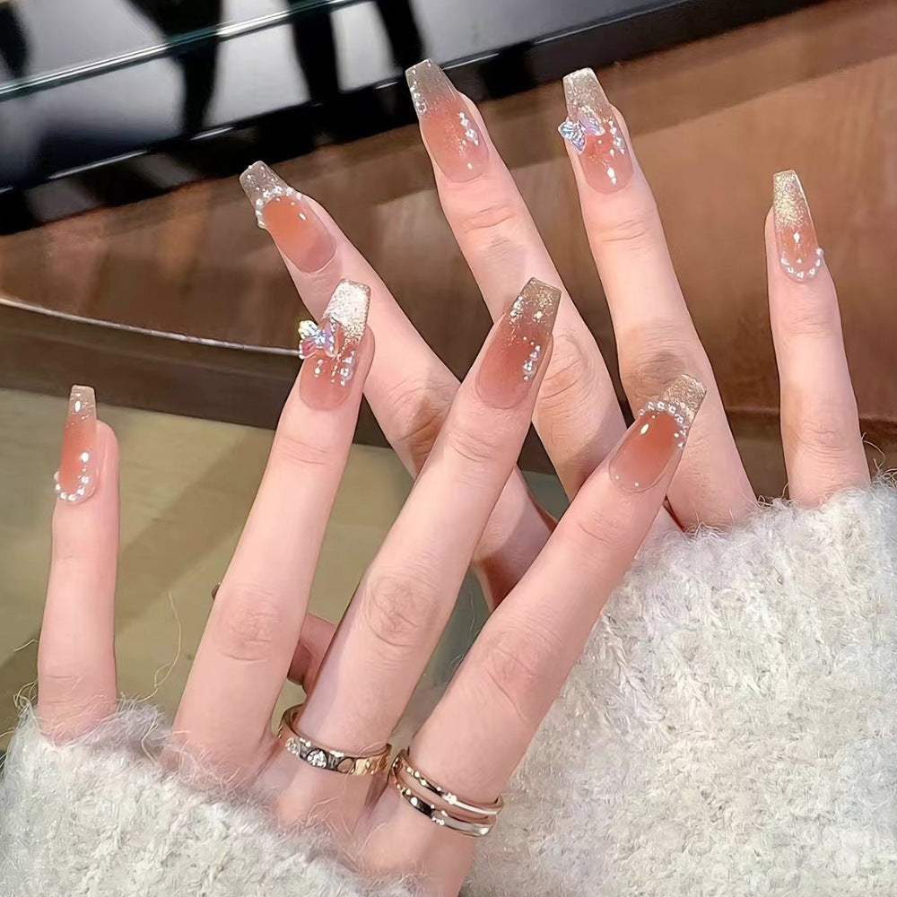 Glamorous artificial nails with elegant bow and butterfly design Bowlift