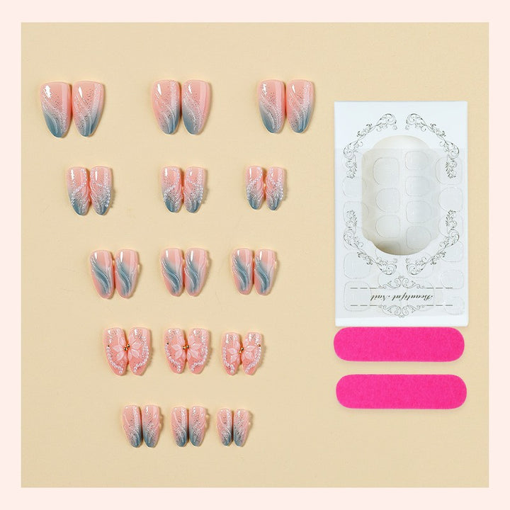 Artificial nail set with floral design and delicate accents Bowlift