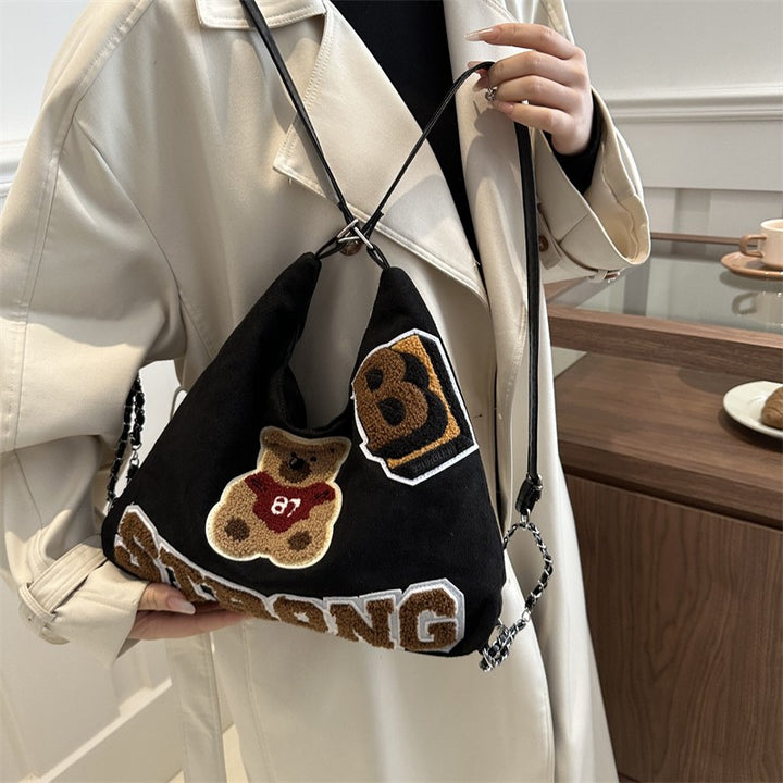 Shoulder bag in playful bear pattern Bowlift
