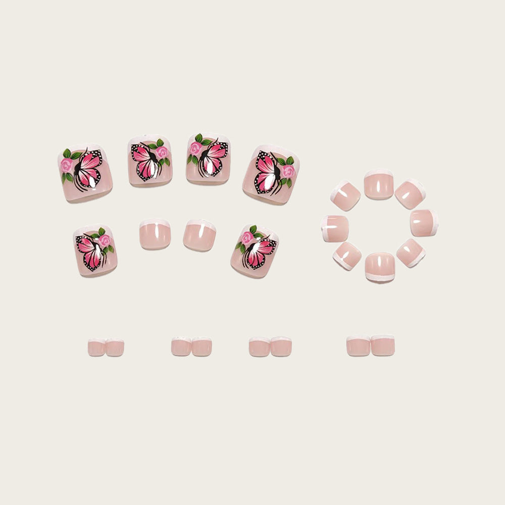 Artistic toenails with butterfly and rose designs Bowlift