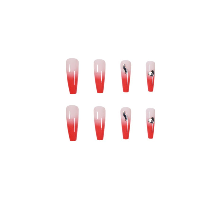 Artful stiletto nails with elegant gradient and rhinestone embellishment Bowlift