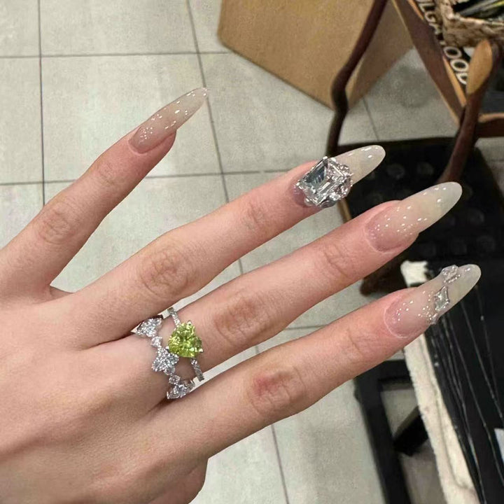 Elegant Stiletto Nail Extensions with Rhinestone Accents Bowlift