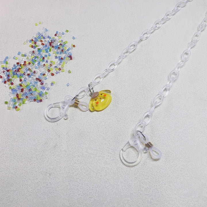 Playful glasses holder chain made of transparent material Bowlift