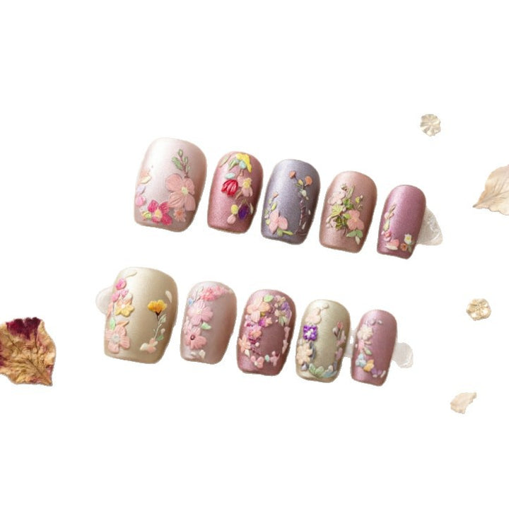 Art nail design with floral motifs Bowlift