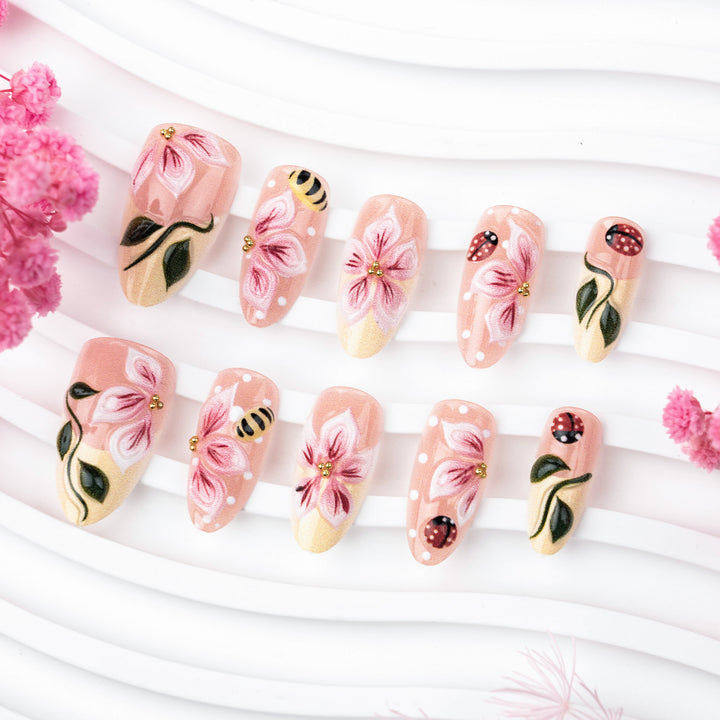 Artificial nail set with floral 3D applications and gloss finish Bowlift