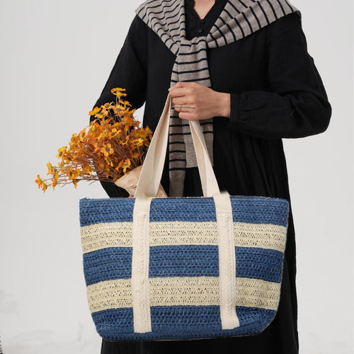Handcrafted beach bag with distinctive striped design Bowlift