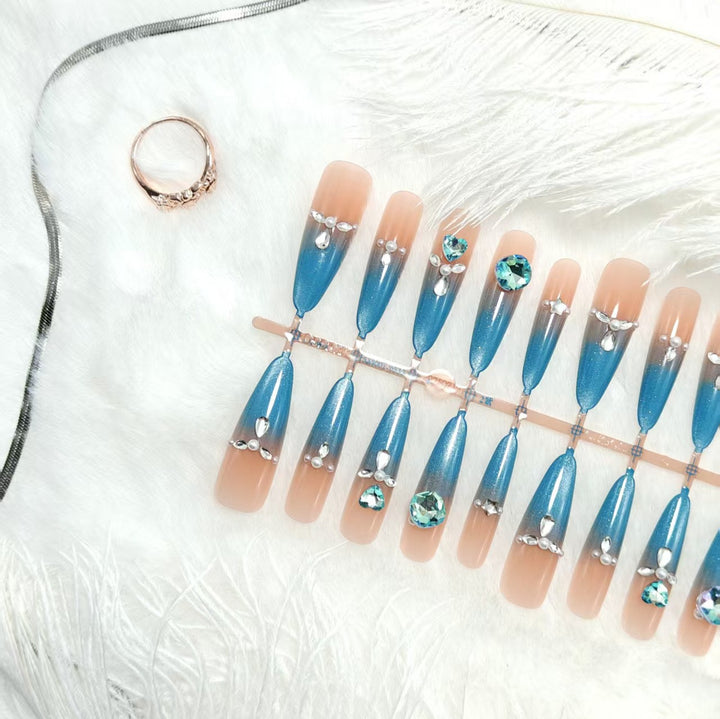 Glamorous artificial nails with sparkling rhinestone elements Bowlift
