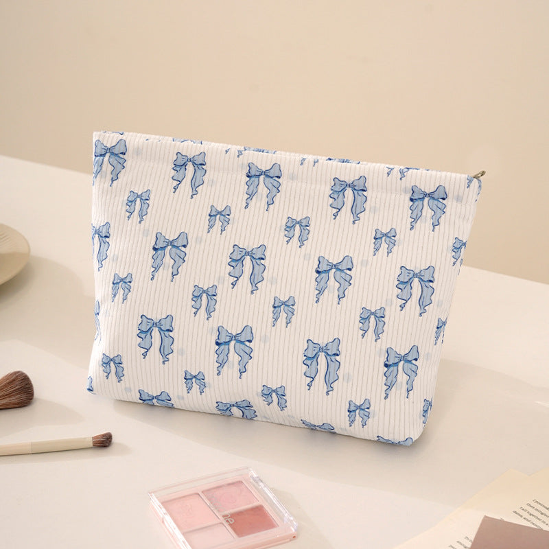 Playful Bow-Patterned Makeup Pouch Bowlift
