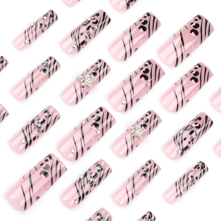 Artful Nail Art with Zebra Pattern and Glitter Accents Bowlift