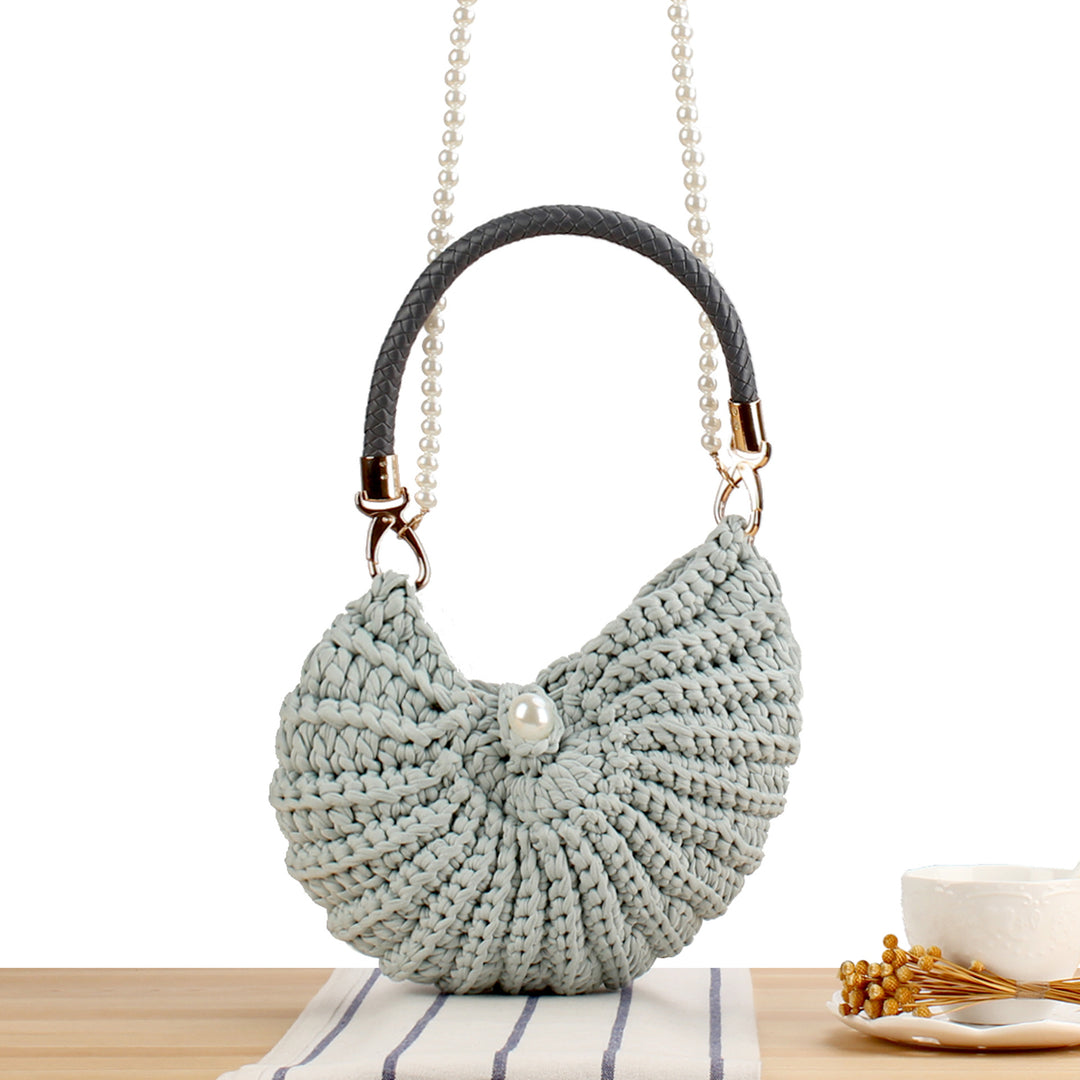 Evening bag with pearl decorated handle Bowlift
