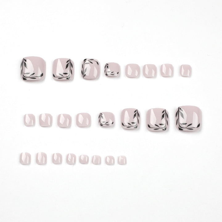 Artful toenail art with delicate leaf motifs Bowlift