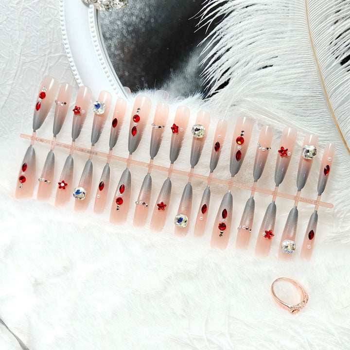 Artificial nails with glamorous design and sparkling accents Bowlift