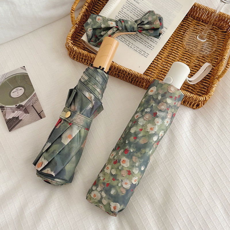 Ladies Folding Umbrella with Floral Design Bowlift