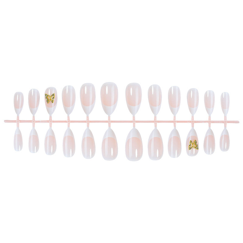 Fashionable Press-On Nail Set with Elegant French Tips and Decorative Accents Bowlift
