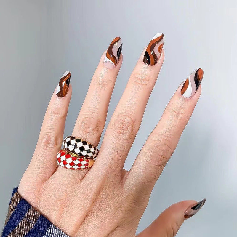 Artfully decorated nail extensions Bowlift