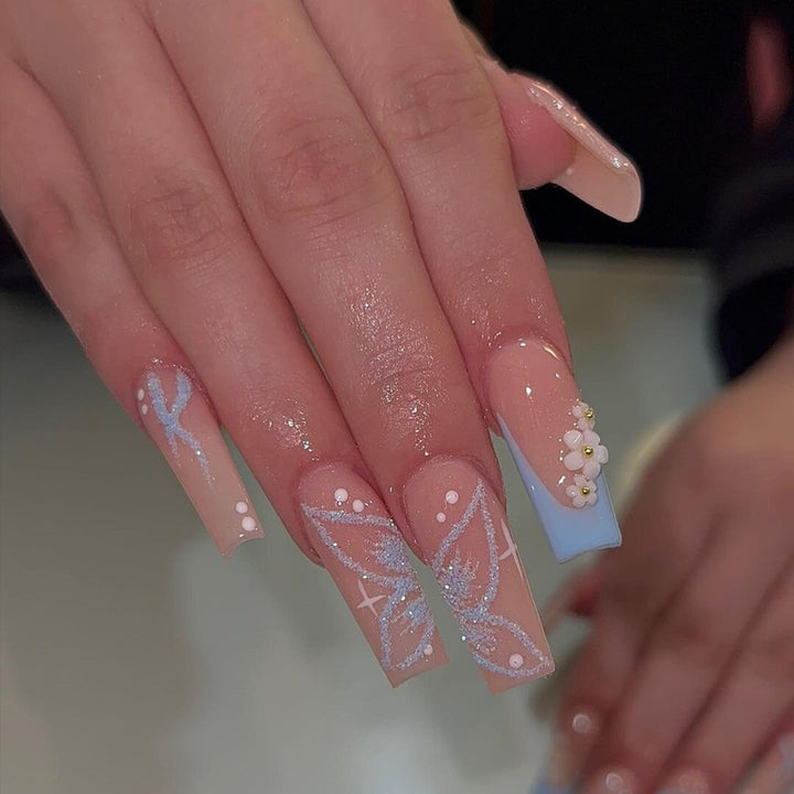 Decorative Long Press-On Nail Set with Floral and Glitter Accents Bowlift