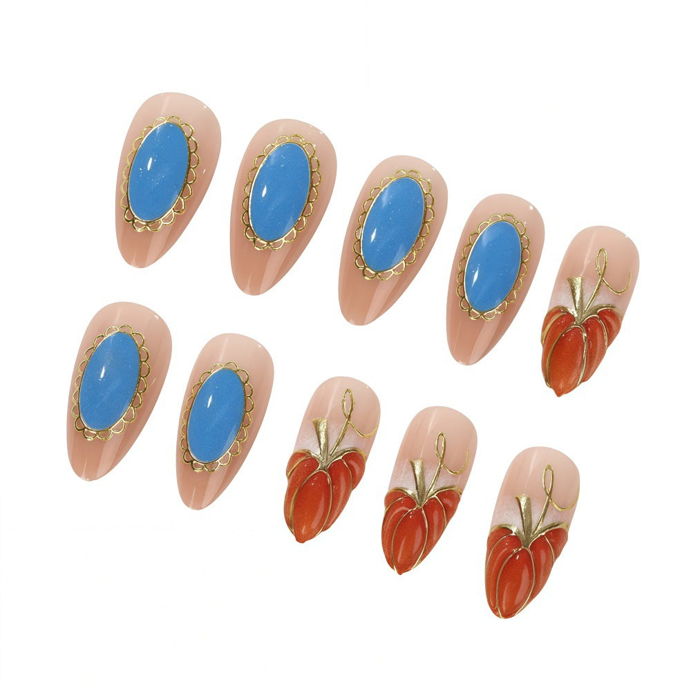 Creative artificial nails with autumn design and detailed accents Bowlift