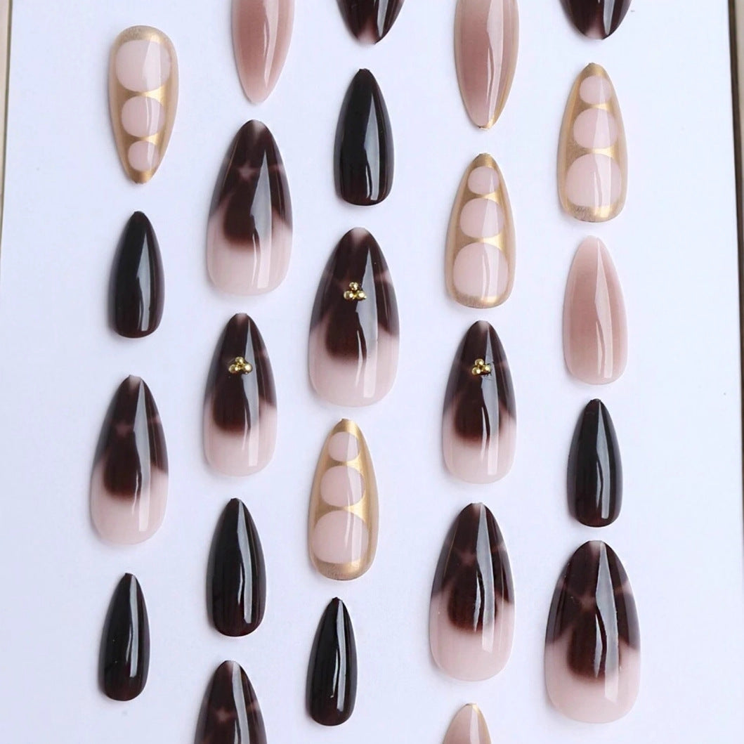 Artificial nail set with elegant ombre design and gold embellishments Bowlift