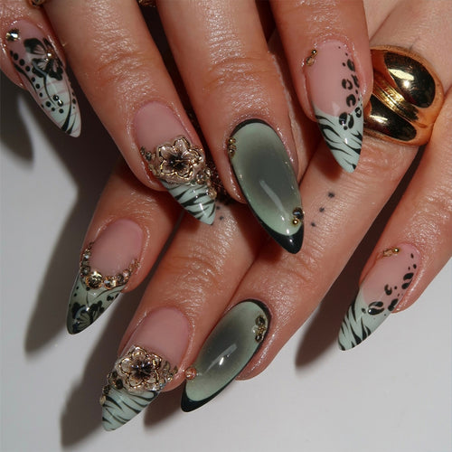 Artful Stiletto Fingernails with Floral and Geometric Decorations Bowlift